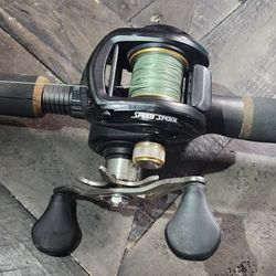 Lews BB2 Wide Spool w/okuma guide select swim bait rod