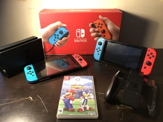 2 Nintendo Switch Consoles + 1 Game Included