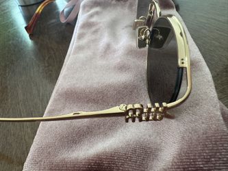 Glasses MIU MIU