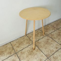 Round  table 24 inches tall  18 inches long