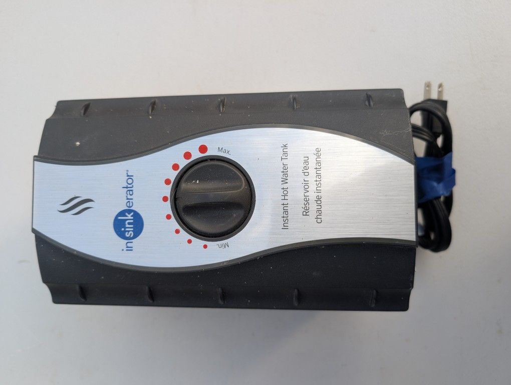 Kitchen InSinkerator Brand Water Heater and dispenser, Garbage Disposer, and faucet