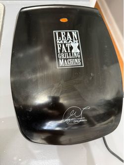 George Foreman grilling machine