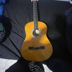 Six string guitar