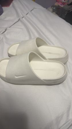 White Nike slides