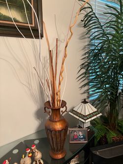 Metal vase with decor