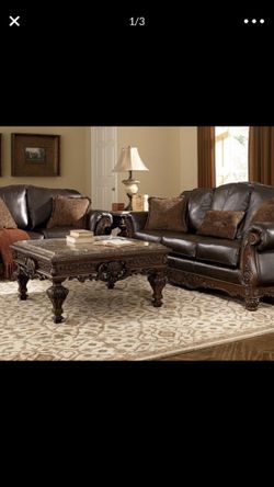 North shore set . Two Sofas . . Real leather..