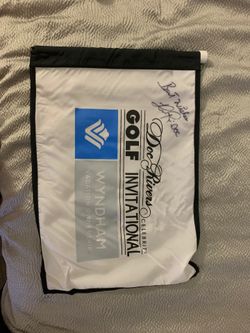 Doc River signed // Celebrity golf invitation banner
