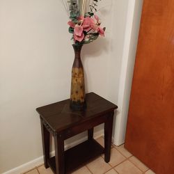 End Table With Vase And Flower Arrangement