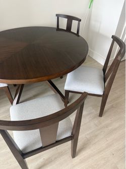 Round table with four chairs