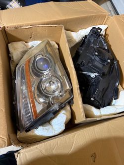 2012 Cadillac front right and left light housing