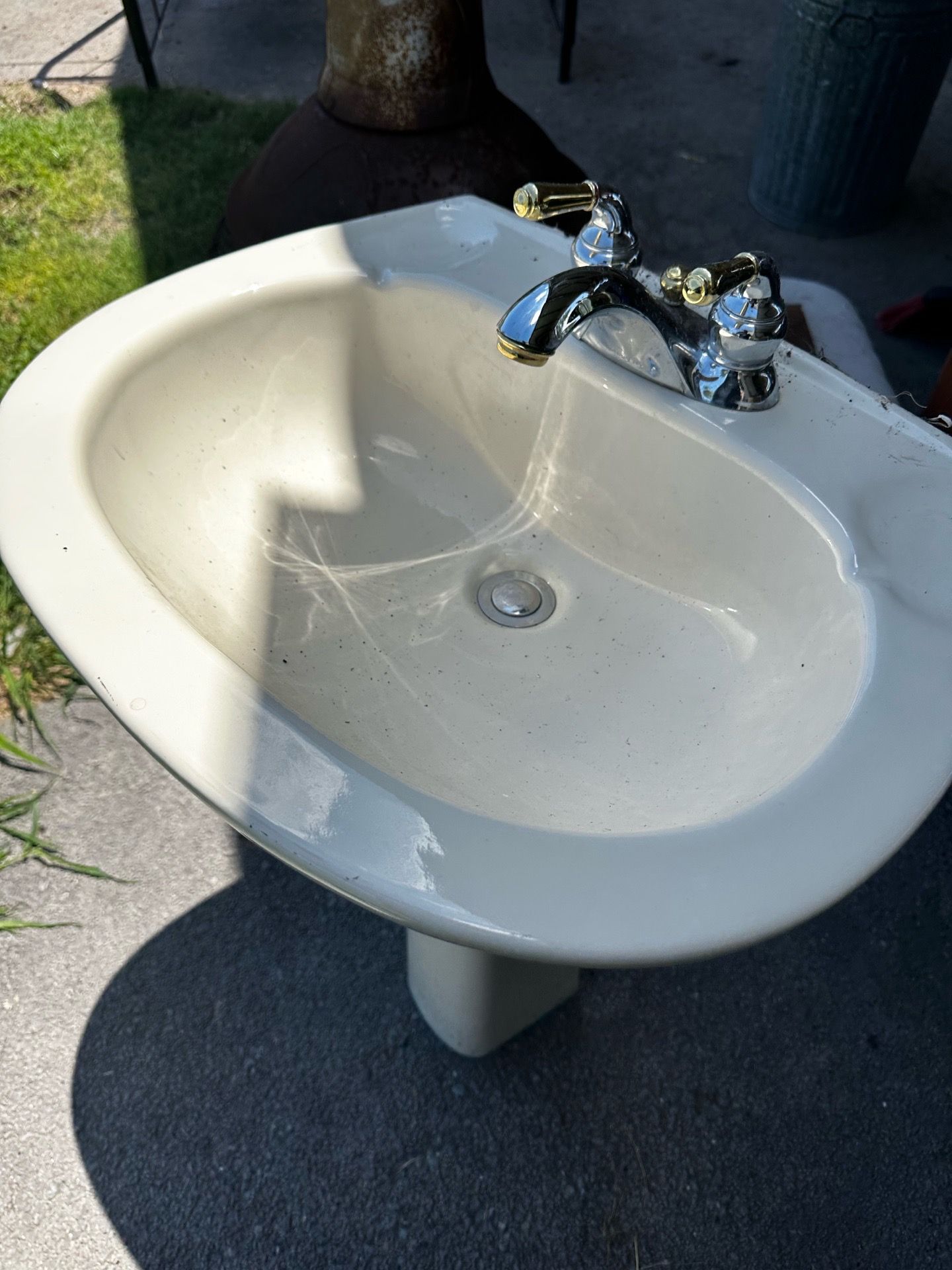 Sink with base and faucet