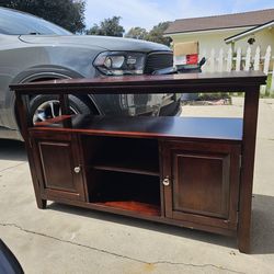 Used TV entertainment center, cherry red