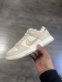 Nike Dunk Low “Gold Swoosh” 