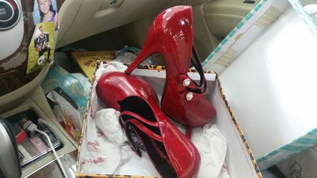 Red Patent leather Mary Jane heels. Excellent condition.