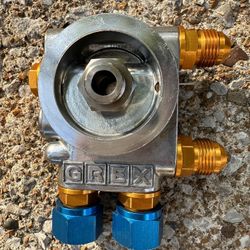 Used Greddy Oil Filter Relocation Plate 