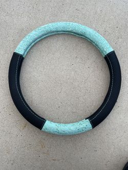 Teal and black steering wheel cover