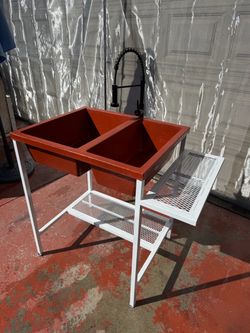 Lavadero de plástico con base y llave de agua todo por solo $350