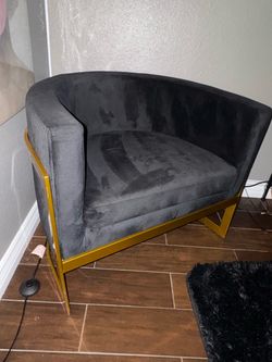 Black chair gold trim
