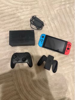 Nintendo switch bundle with pro controller charger and TV system