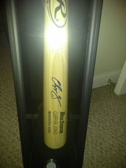 Chipper jones sighed Rawlings big stick in UV protected case and signed game baseball both with certificate of authenticity