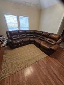 Beautiful leather sectional with 2 recliners