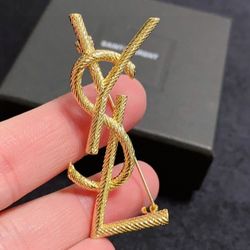 Yves Saint Laurent 
brooch