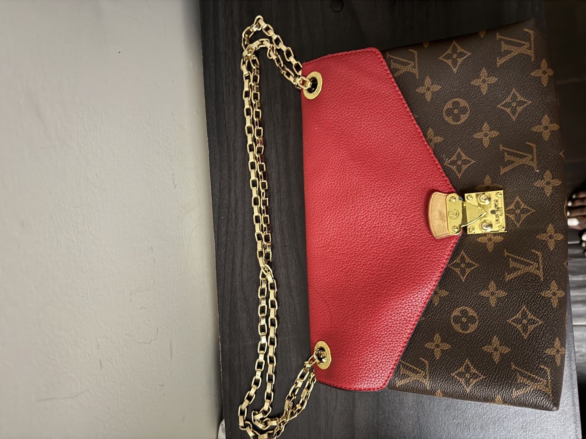Louis Vuitton Pochette Métis Monogram Canvas w/ Red Flap & Gold Chain