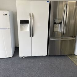 White side-by-side Frigidaire refrigerator