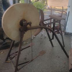 Antique Pedal Grinder, plows and hand truck.