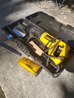 DeWalt reciprocal saw, extra blades, with case.