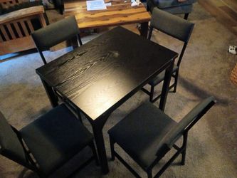 Convertible dinning room table for four