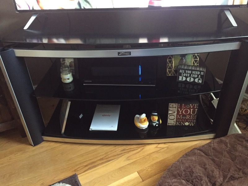 Tv stand with glass shelving