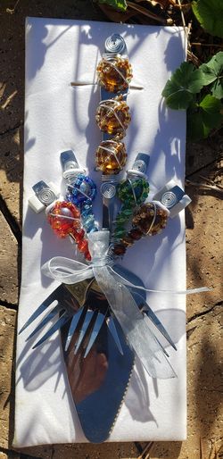 Serving knife and four decorative forks