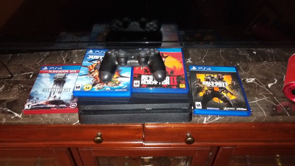 Pristine Condition PS4! 1TB Model... Comes with four games and two Dualshock controllers!