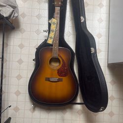 Guitar And Hard Leather Case 