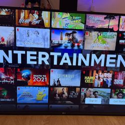 LG 55” 4K UHD Smart TV (webOS, Magic Remote, Netflix, YouTube, Hulu, etc.) – Excellent Condition