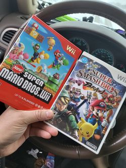 2 Nintendo Wii Games 
New Super Mario Bros 
And super smash Bros brawl