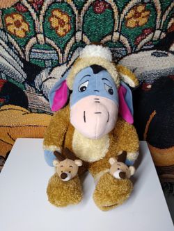 Disney Eeyore plush in reindeer costume