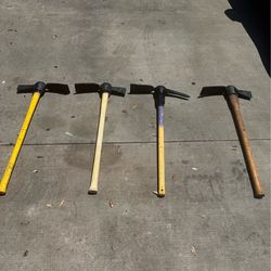 Mattocks rubber handles $20 each/cada uno
