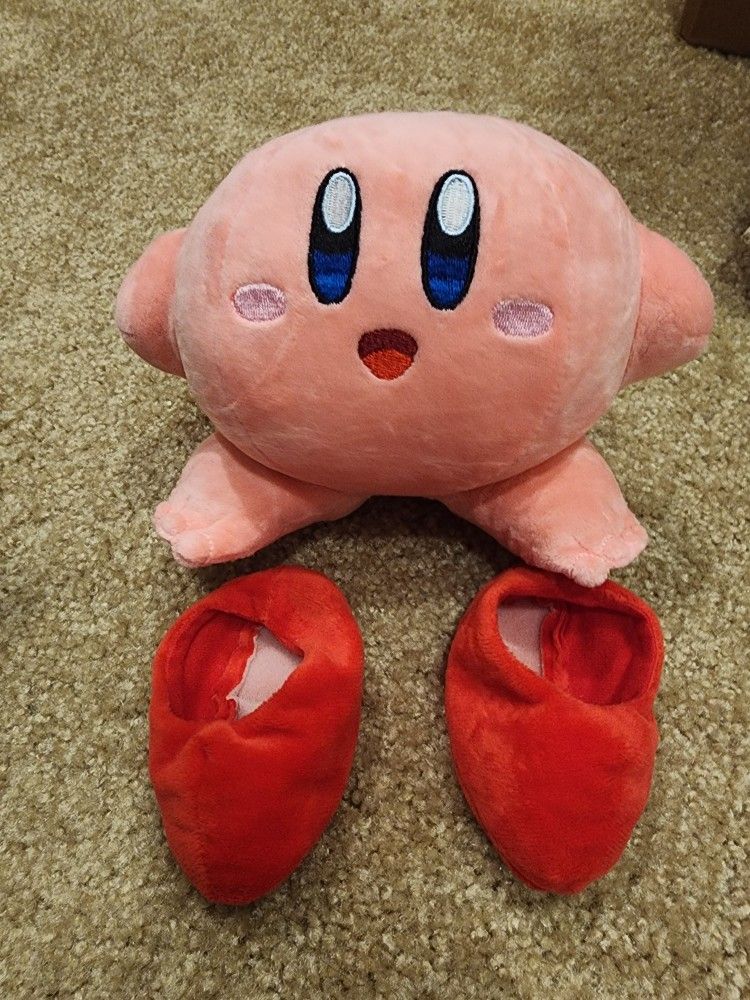 Ever wonder what's under the the cute lil guys big red boots?! Well now you know! XD
Humorous Kirby without shoes Plush