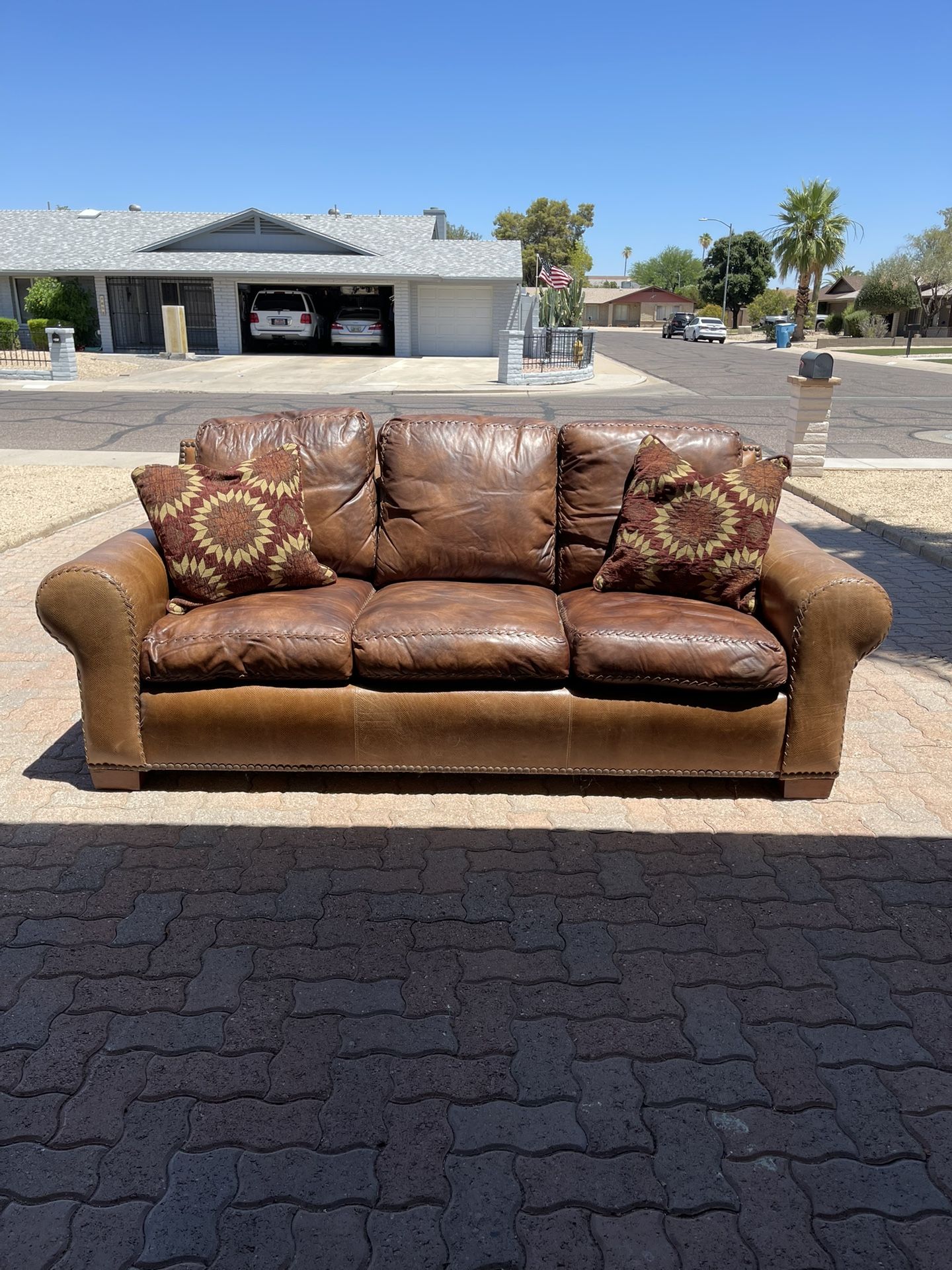 Alexander Sinclair, down-filled high-end leather couch,