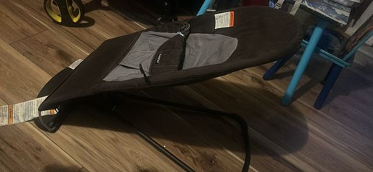 Baby bouncer newborn to 9 months grey an black