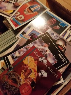 Football basketball, baseball, and hocky cards