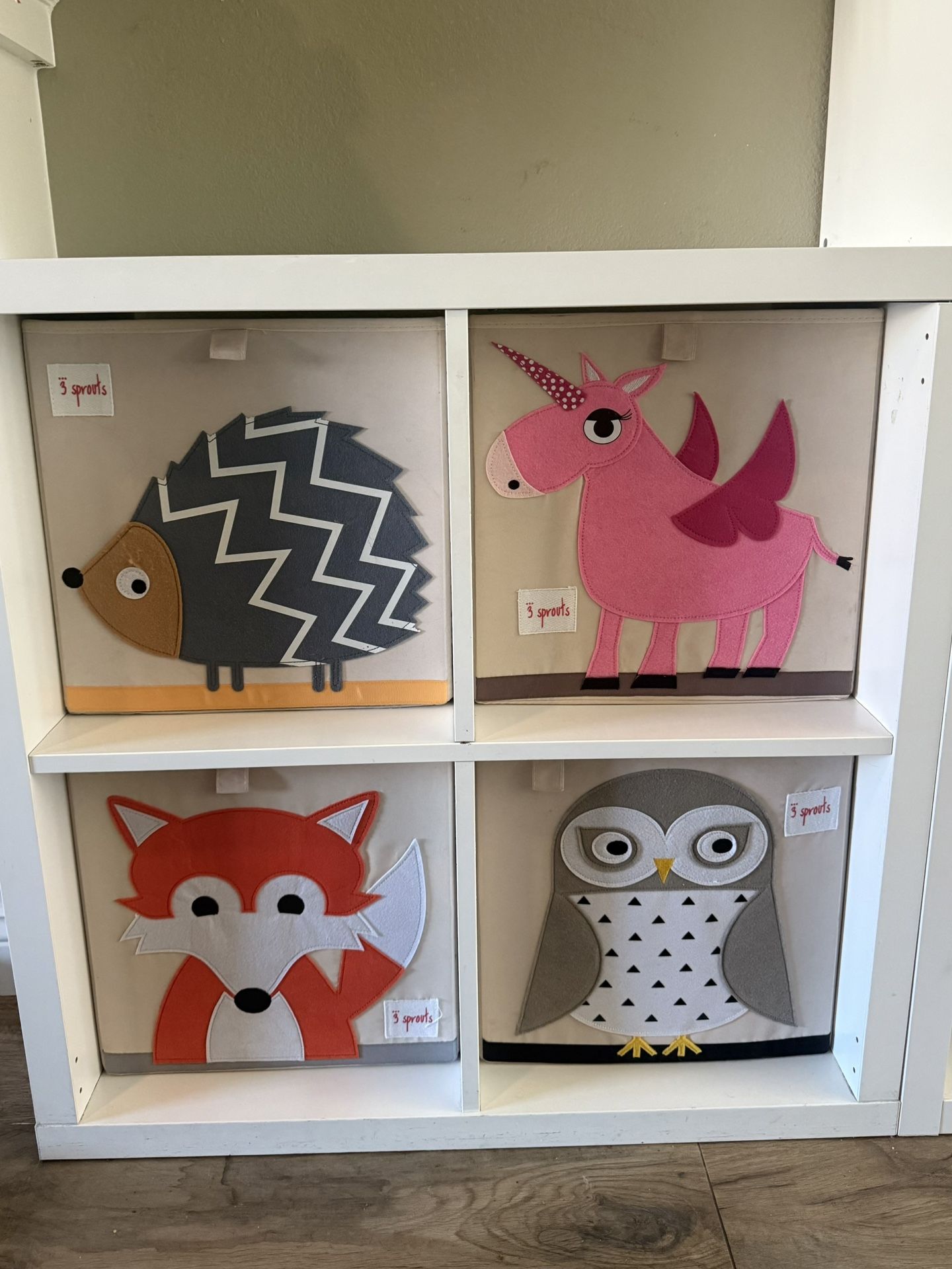 White 2x2 Cubby unit with 4 canvas bins $80 Separately $40 4 bins OR $40 white 2x2