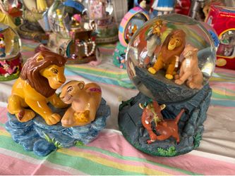 Disney snowglobe and musical figurine