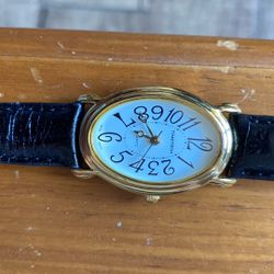 Woman’s Time Tech Gold Tone Watch