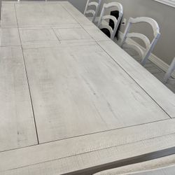 White Distressed 94-112” Extendable Dining Table with 8 chairs