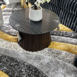 Black stone with dark brown wood coffee table