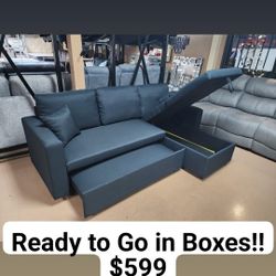 Black Sectional With Storage And Pop Up Sleeper 