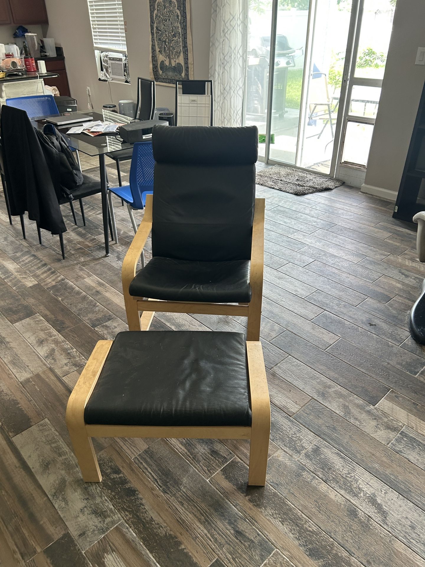 Black Leather IKEA Chair With Foot Stool